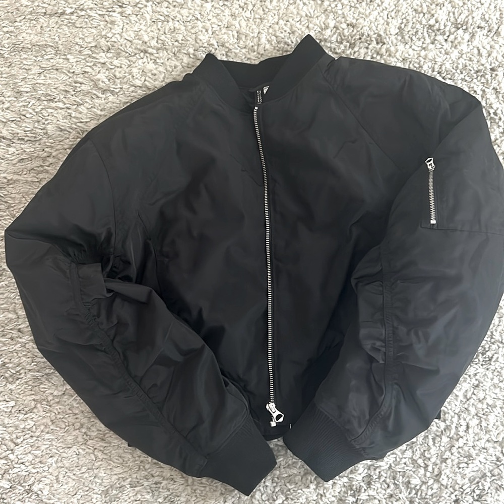 H&M Black bomber jacket. Zip up, pockets plus little zipper pocket on sleeve